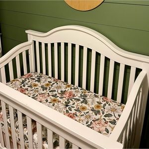 Boho floral crib sheet (1) and matching changing pad covers (2)